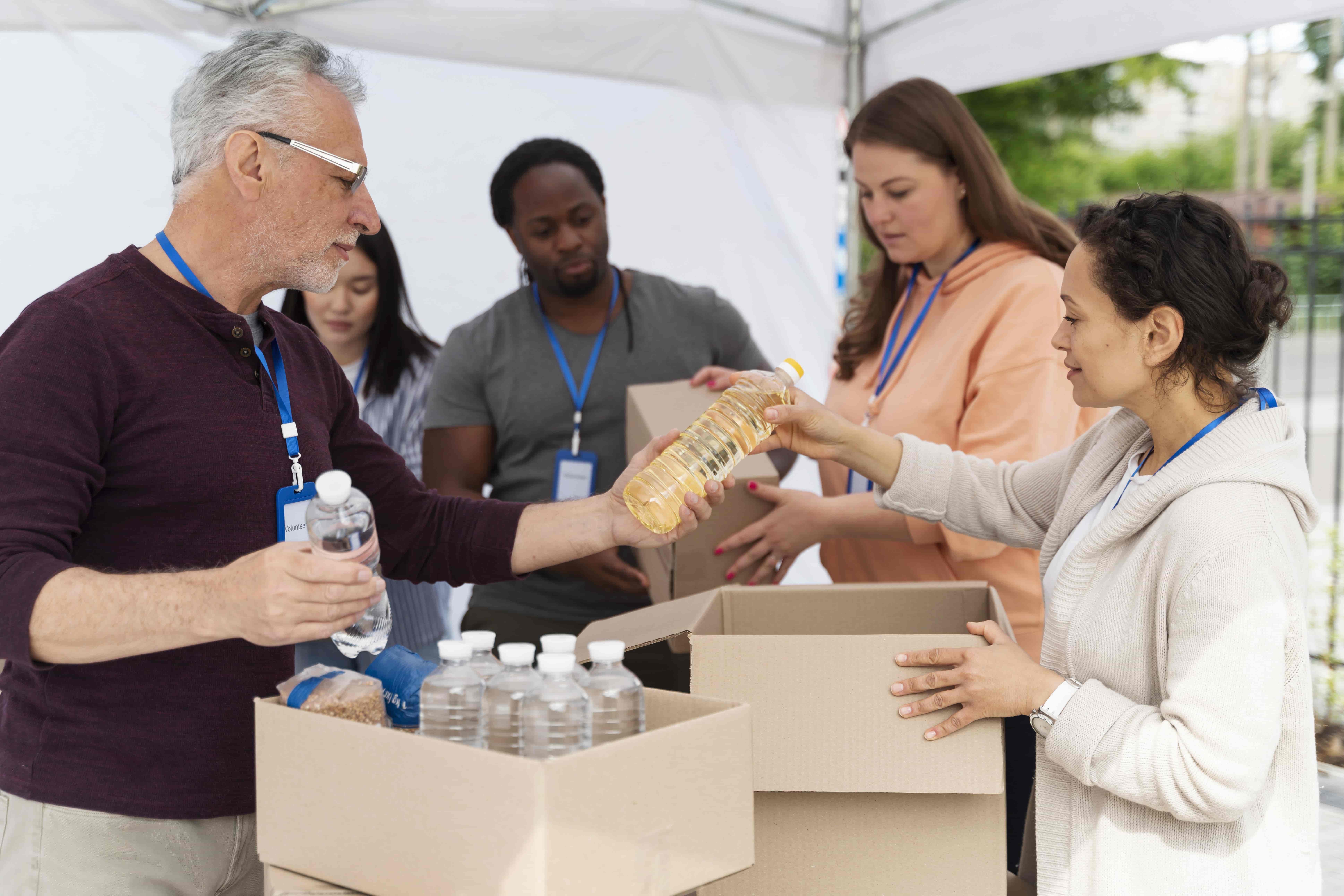 group people volunteering foodbank